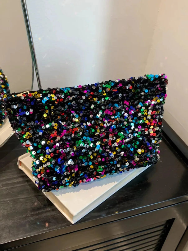 Bolso de mano con cremallera y lentejuelas brillantes