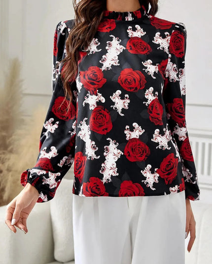 Blusa de cuello alto con mangas largas y estampado floral con volantes