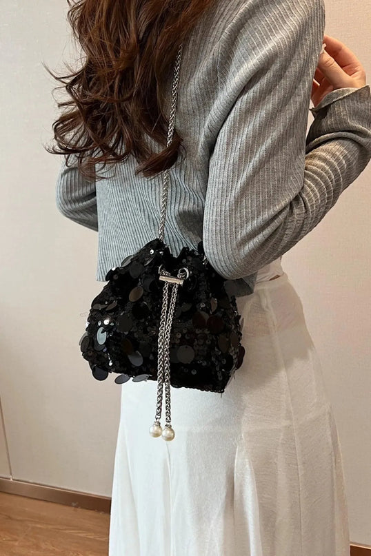 Bolso bandolera con lentejuelas y cordón