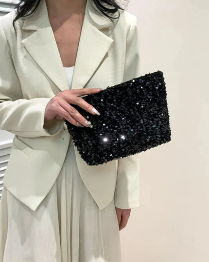 Bolso de mano con cremallera y lentejuelas brillantes