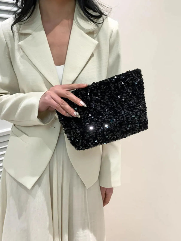 Bolso de mano con cremallera y lentejuelas brillantes