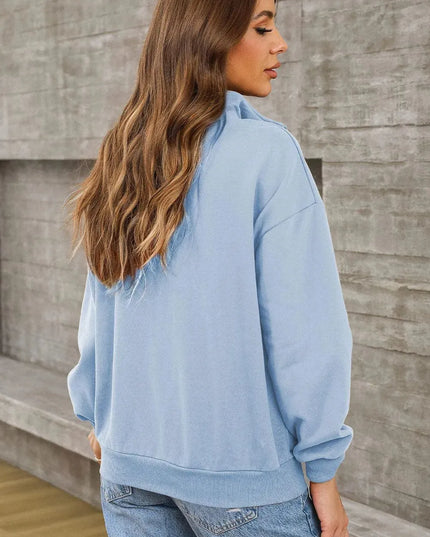 Casual Pocketed Quarter Zip Sweatshirt with Dropped Shoulders