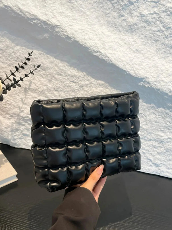 Bolso de mano con cremallera y acolchado a cuadros