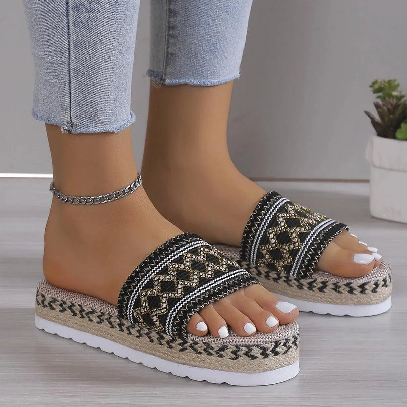 Sandalias elegantes de plataforma plana con punta abierta