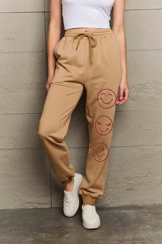 Pantalones deportivos largos informales con estampado de emojis