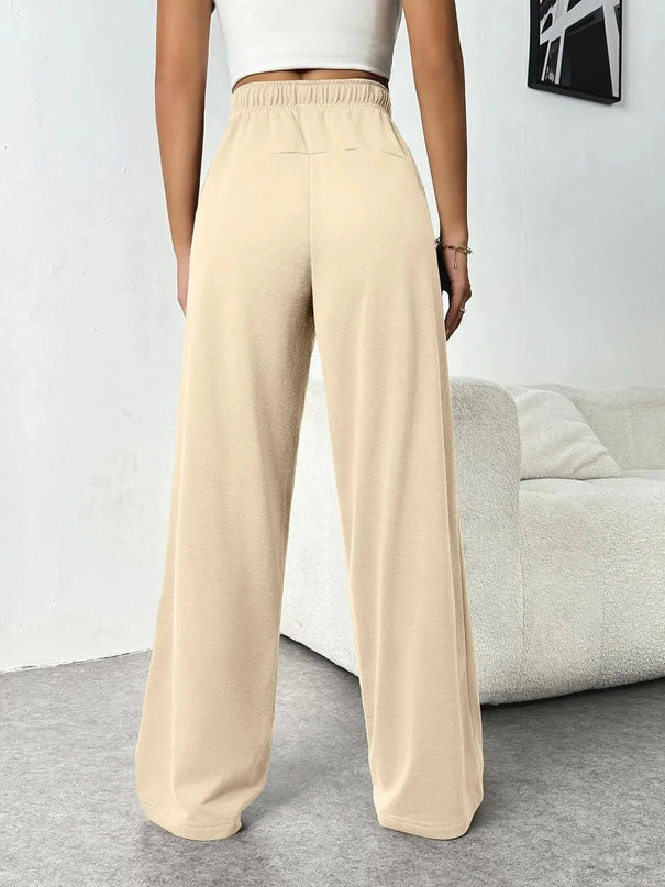 Pantalones anchos con bolsillos y cordón