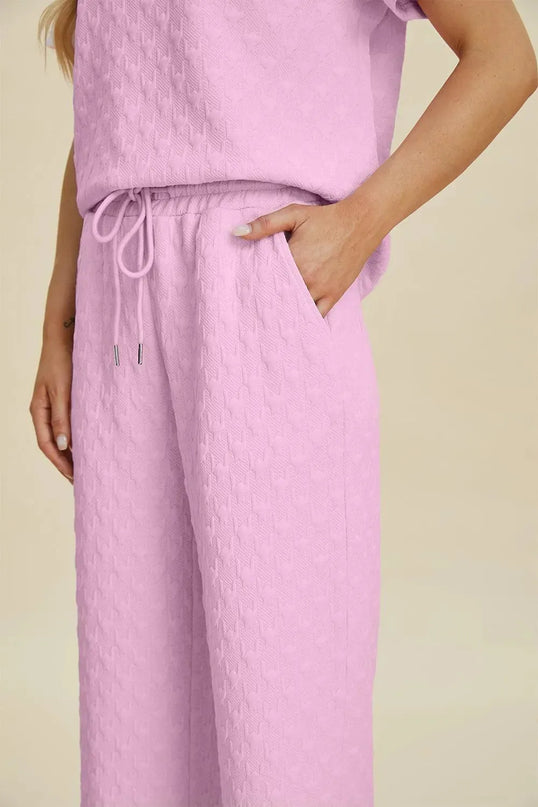 Conjunto de dos piezas de top y pantalón texturizado cómodo con bolsillos