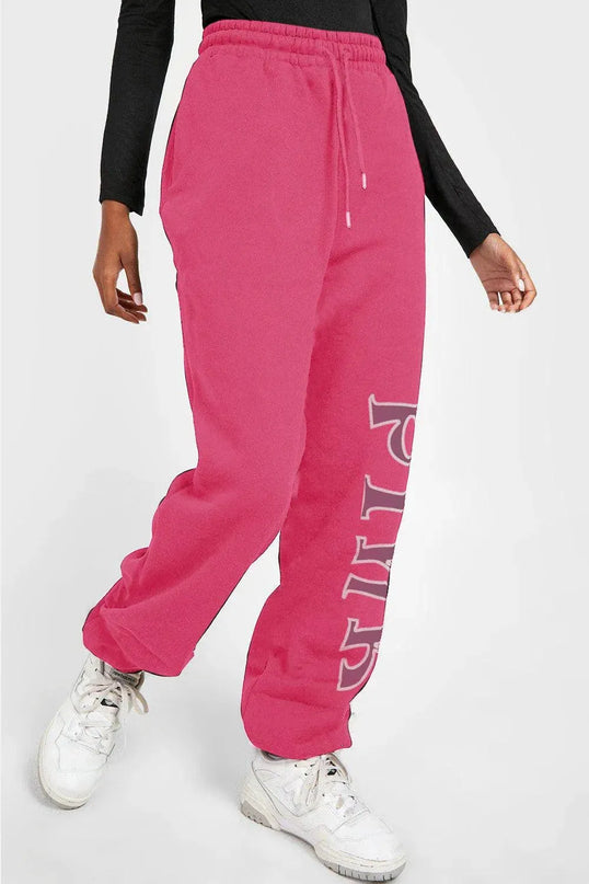 Pantalones deportivos elegantes con gráficos en color rosa para una comodidad diaria