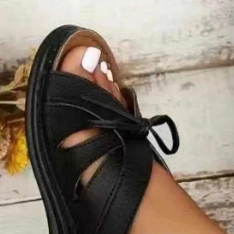 Sandalias de tacón bajo con punta abierta y lazo elegante