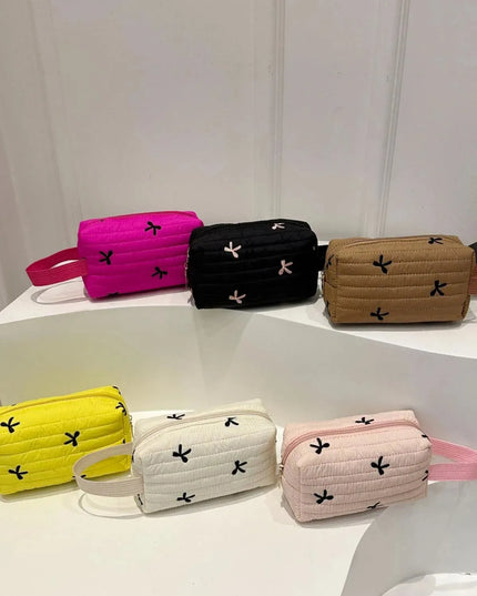 Textured Bow Detail Mini Wristlet