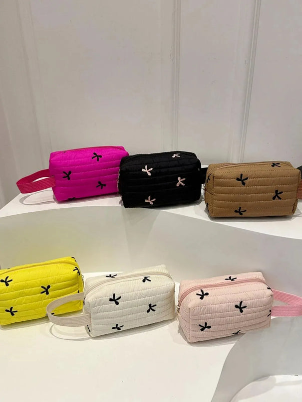 Textured Bow Detail Mini Wristlet