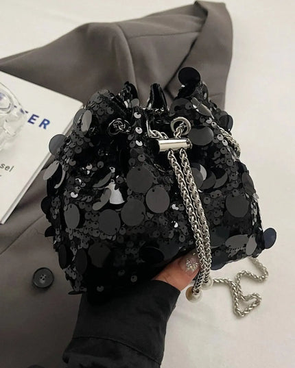 Bolso bandolera con lentejuelas y cordón