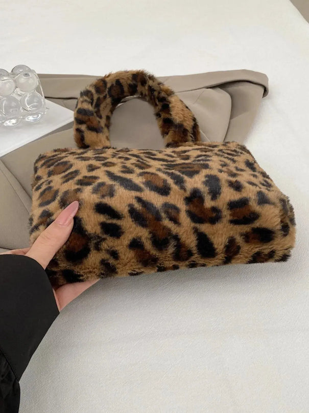 Bolso de mano con cremallera y estampado de leopardo