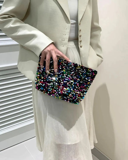 Bolso de mano con cremallera y lentejuelas brillantes