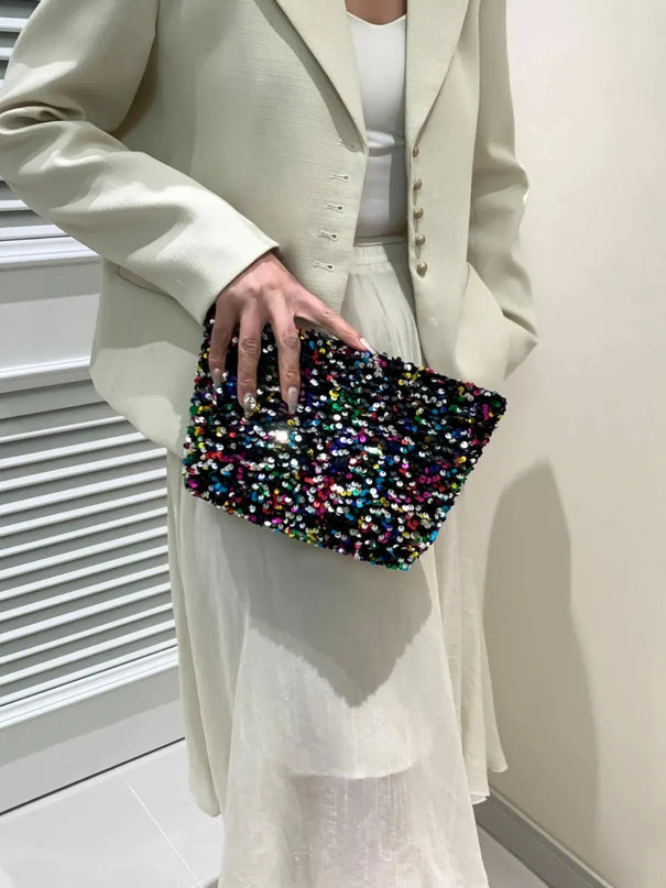 Bolso de mano con cremallera y lentejuelas brillantes