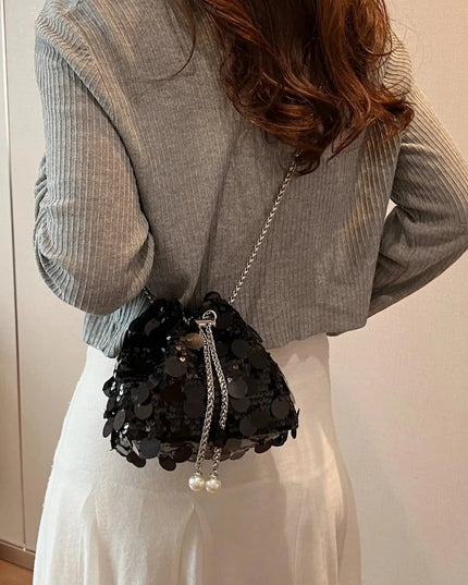 Bolso bandolera con lentejuelas y cordón