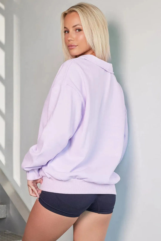 Casual Pocketed Quarter Zip Sweatshirt with Dropped Shoulders