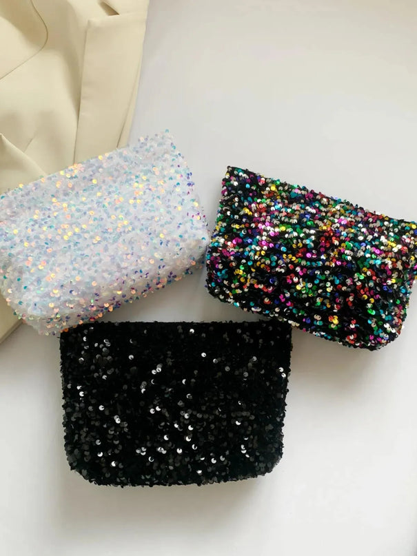 Bolso de mano con cremallera y lentejuelas brillantes