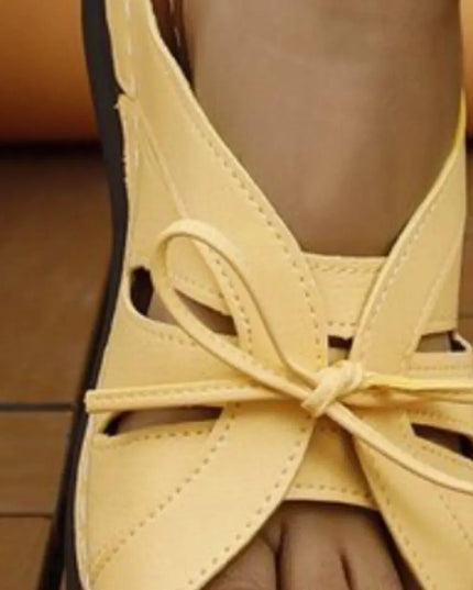 Sandalias de tacón bajo con punta abierta y lazo elegante