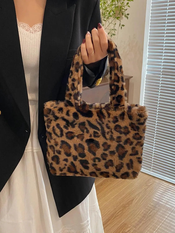 Bolso de mano con cremallera y estampado de leopardo