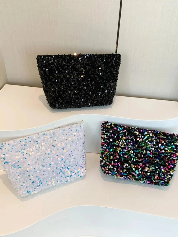 Bolso de mano con cremallera y lentejuelas brillantes