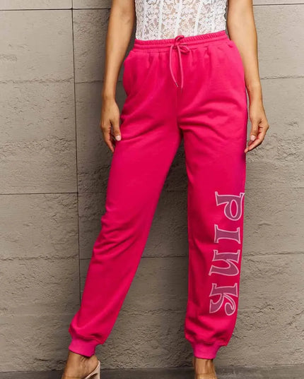 Pantalones deportivos elegantes con gráficos en color rosa para una comodidad diaria