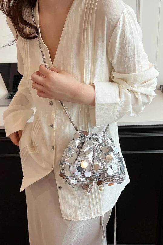 Bolso bandolera con lentejuelas y cordón