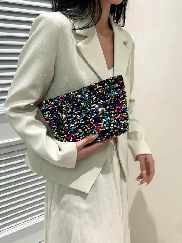 Bolso de mano con cremallera y lentejuelas brillantes