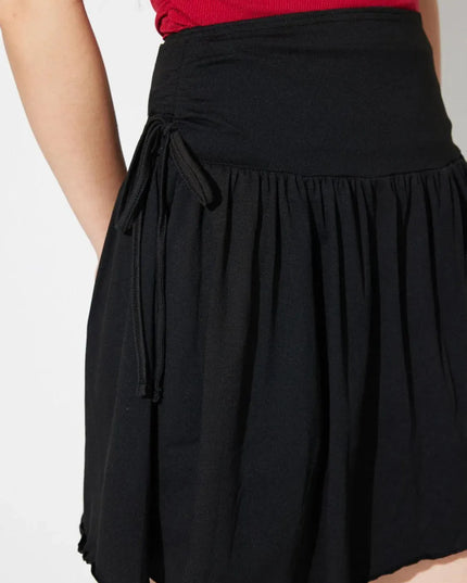 Asymmetrical Hem Mini Skirt with Side Tie Detail