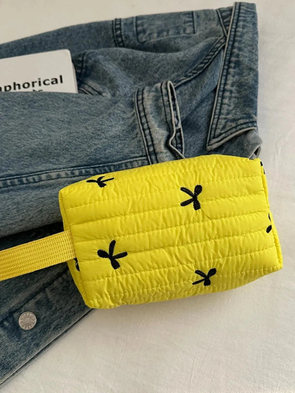 Minibolso de mano con detalle de lazo texturizado