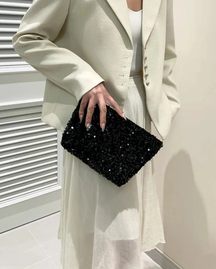 Bolso de mano con cremallera y lentejuelas brillantes