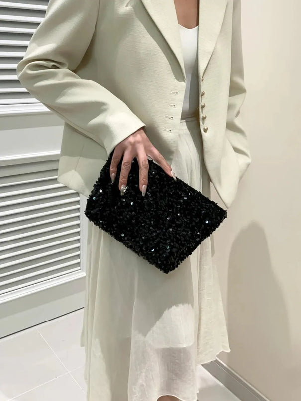 Bolso de mano con cremallera y lentejuelas brillantes