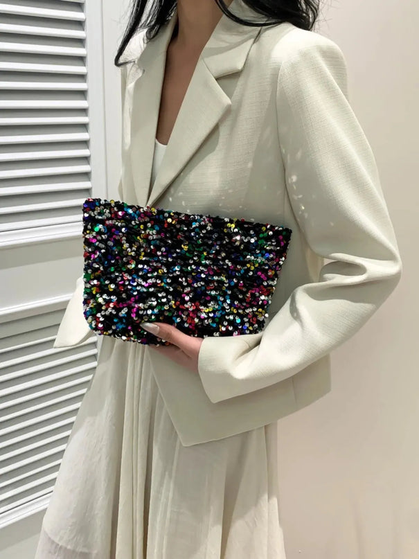 Bolso de mano con cremallera y lentejuelas brillantes