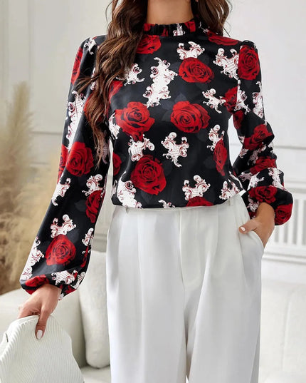 Blusa de cuello alto con mangas largas y estampado floral con volantes