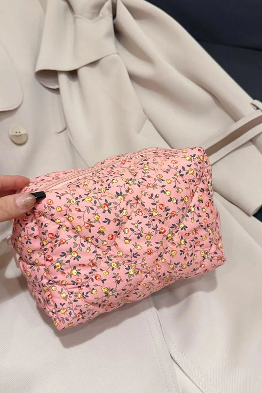 Cartera de mano acolchada con diseño floral y interior a cuadros