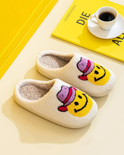 Pantuflas con cara sonriente y alegre