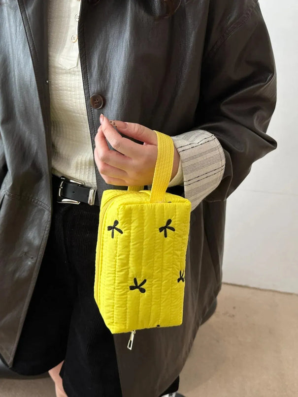 Minibolso de mano con detalle de lazo texturizado