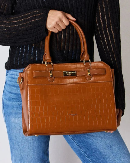 Bolso de mano de piel sintética con textura de David Jones