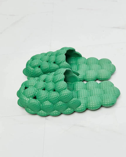 Pantuflas cómodas con burbujas verdes para una comodidad máxima