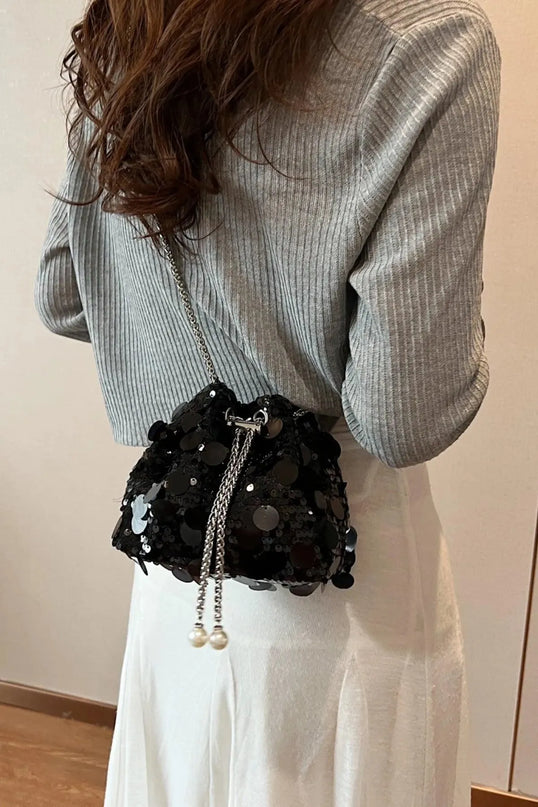 Bolso bandolera con lentejuelas y cordón