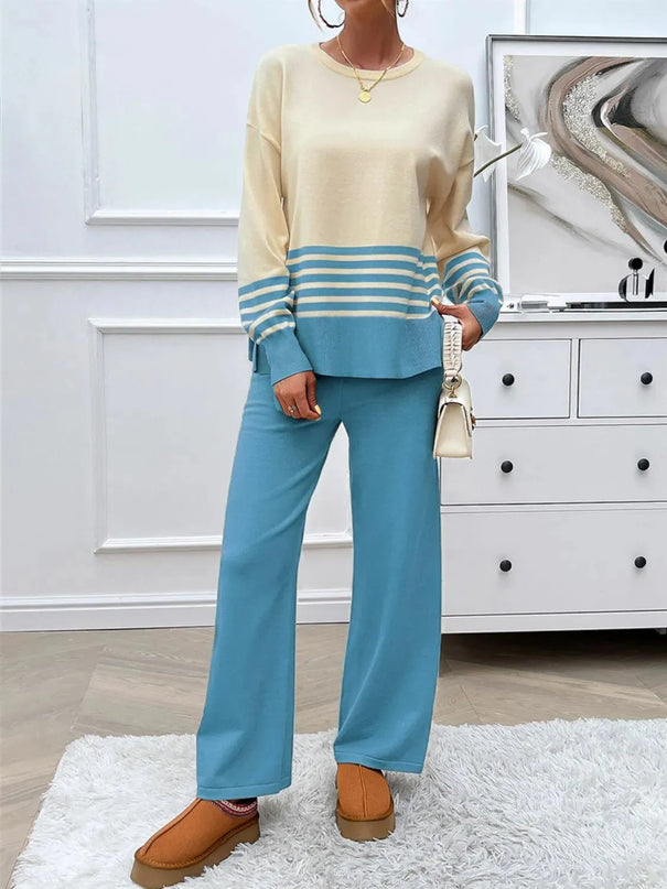 Conjunto elegante de top y pantalón de punto a rayas con aberturas