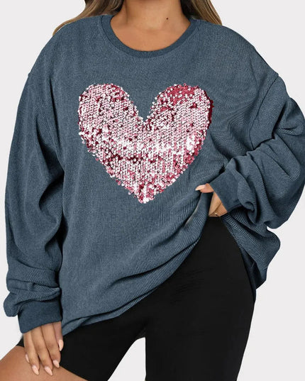 Sudadera con lentejuelas y corazón brillante de talla grande