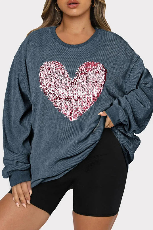 Sudadera con lentejuelas y corazón brillante de talla grande