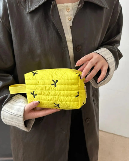 Minibolso de mano con detalle de lazo texturizado