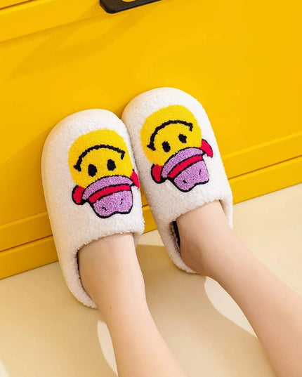 Pantuflas con cara sonriente y alegre