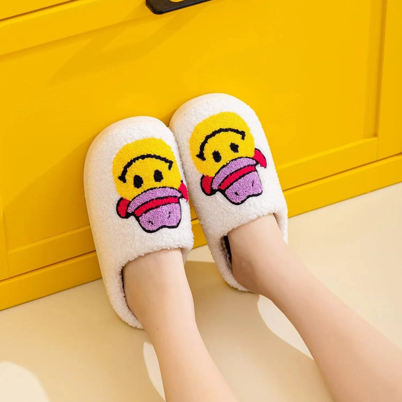 Pantuflas con cara sonriente y alegre