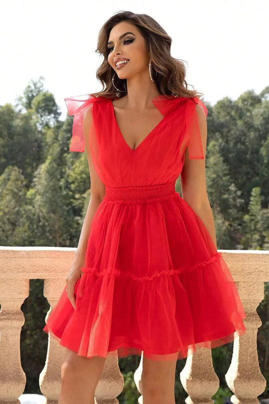 Vestido de malla con escote en V y detalle en los hombros