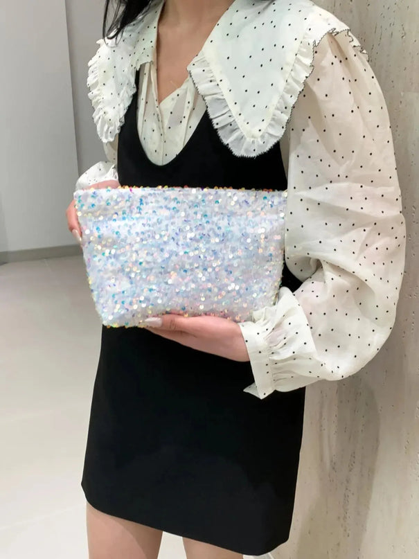 Bolso de mano con cremallera y lentejuelas brillantes